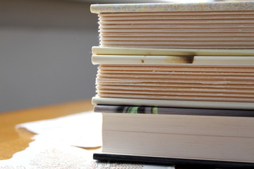 Hardcover books with rough-edged pages