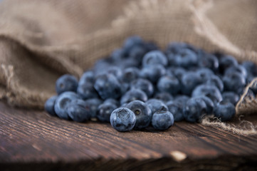 Blueberries on an old wooden table