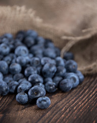 Blueberries on an old wooden table