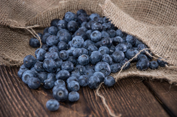 Blueberries on an old wooden table
