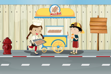 Kids and a meat ball street cart