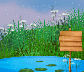 Un étang et le panneau en bois