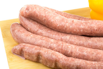 raw sausages and ingredients