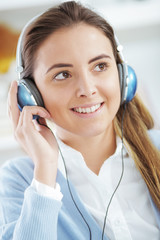 young woman enjoying music