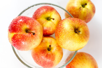 Close up fresh apples and water drop on white background.