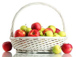 juicy apples in basket, isolated on white
