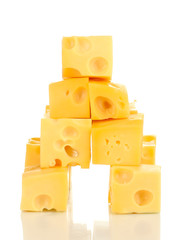 Cheese cubes isolated on white
