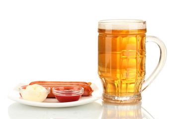 Beer and grilled sausages isolated on white