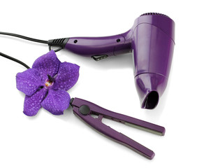 Hair dryer and straighteners , isolated on white