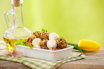 fresh cheese balls with oil and spices