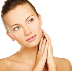 Young woman touching her neck isolated on white background