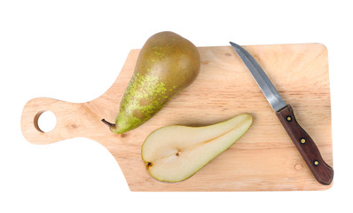 Pear, knife and chopping board