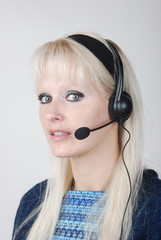 Portrait of young woman with headset