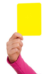 Hand zeigt gelbe Karte