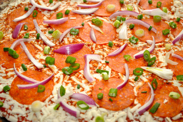 Raw Onion and Pepperoni Pizza