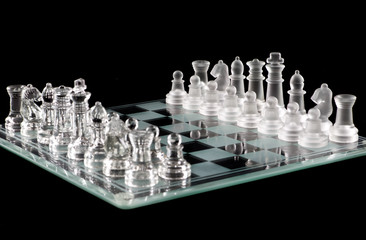 Glass chess over black