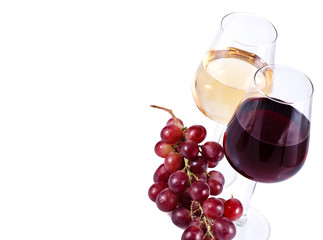 two wine glasses with red and white wine and grapes