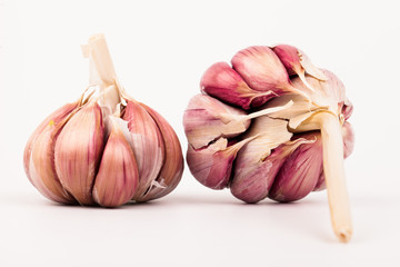 Garlic cloves isolated on white background