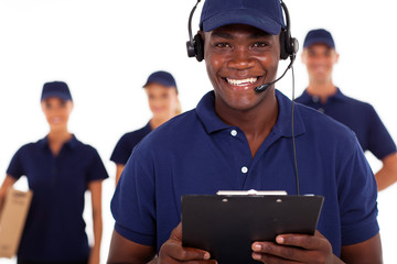 african american male courier service despatcher and team - Powered by Adobe