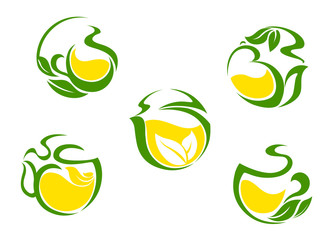 Tea symbols with lemon and green leaves