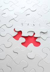 puzzle with missing red piece