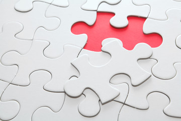 Fototapeta premium puzzle with missing red piece