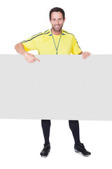 Soccer judge presenting empty banner