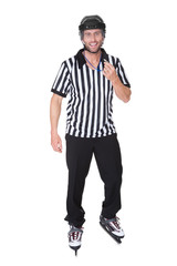 Portrait of hockey judge whistling