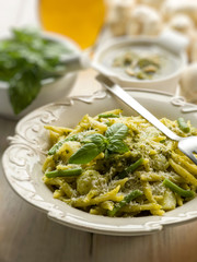 pesto trofie typical genoa recipe, selective focus