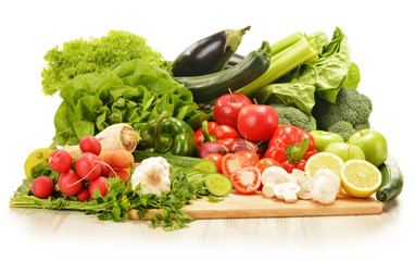 Composition with raw vegetables isolated on white