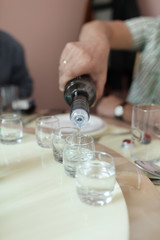 Man pours vodka
