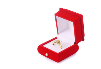 Golden ring in a red box isolated on white background