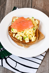 Scrambled egg and salmon on toast