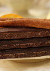 Three bars of chocolate and cinnamon