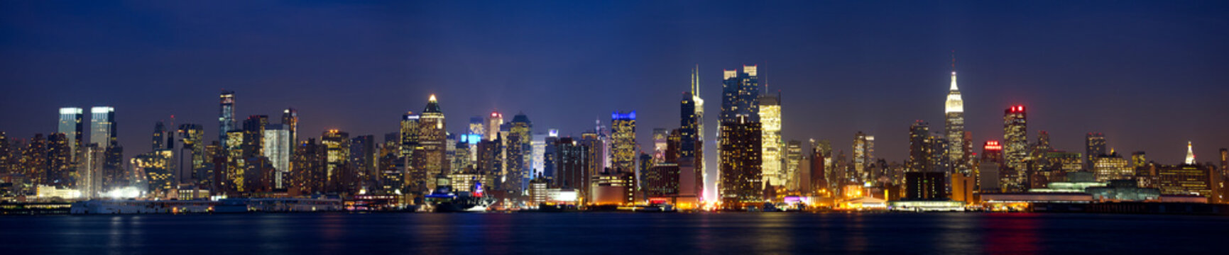Manhattan skyline panorama at dusk, New York City