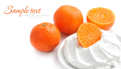 Cream with tangerines on a white background