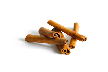 Cinnamon sticks or bark quills, isolated on white background