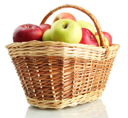 juicy apples in basket, isolated on white