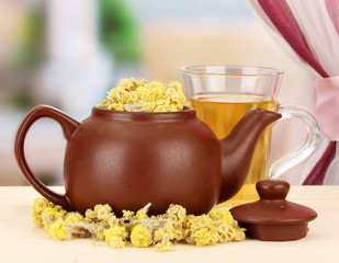 Dried herbs in teapot