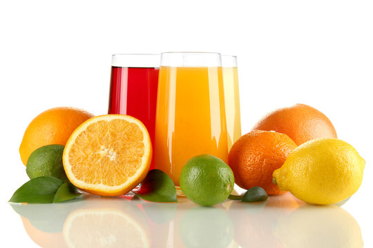 Glasses of juise with leafs and fruits isolated on white