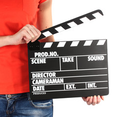 Movie production clapper board in hands isolated on white