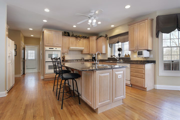 Kitchen with oak wood cabinetry