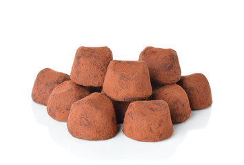 Chocolate truffles on a white background