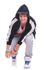 leaning forward & sticking his tongue