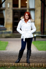 Fototapeta premium Pretty young red haired female outdoors