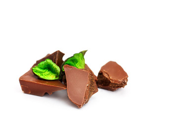 Chocolate pieces on a white background