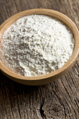 flour in wooden bowl