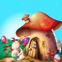  Paaseieren verstopt in de buurt van een door paddenstoelen ontworpen huis © GraphicsRF