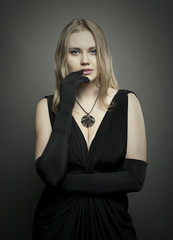 Fototapeta premium blond woman with elegant black dress