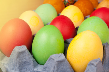 Fototapeta na wymiar Bright background of colorful eggs
